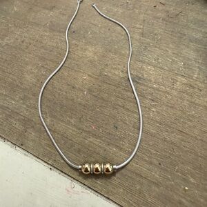 Elegant Silver and Gold Beaded Necklace